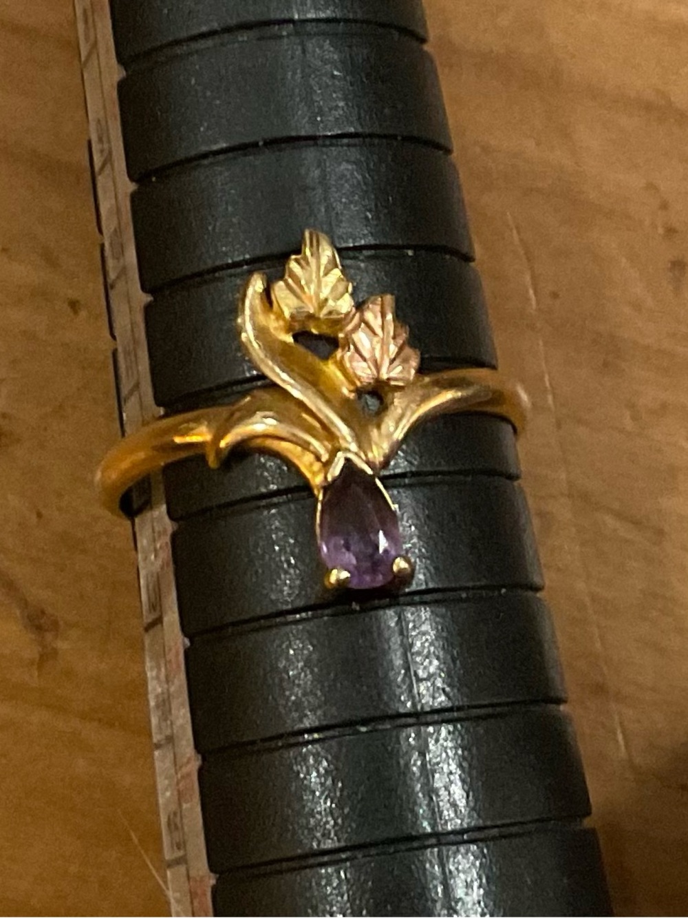 Black Hills Gold: 10k. Delicate yellow gold leafs and purple amethyst size6 ring